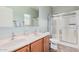 Bathroom with double vanity and large walk-in shower at 830 E Tortoise Trl, San Tan Valley, AZ 85143