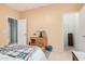 Bright bedroom with cozy bedding and built-in closet at 830 E Tortoise Trl, San Tan Valley, AZ 85143
