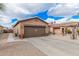 House exterior with walkway leading to the front door at 830 E Tortoise Trl, San Tan Valley, AZ 85143