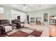 Living room with two brown recliners and area rug at 830 E Tortoise Trl, San Tan Valley, AZ 85143