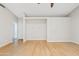 Open living room featuring hardwood floors, bright walls, and recessed lighting at 955 E Vaughn Ave, Gilbert, AZ 85234