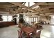 Relaxing community room with a fireplace and high ceilings at 9707 E Mountain View Rd # 2430, Scottsdale, AZ 85258