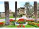 Community entrance with landscaping and bell tower at 9707 E Mountain View Rd # 2430, Scottsdale, AZ 85258