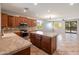 Well-equipped kitchen boasting stainless steel appliances and a center island at 12541 W Miner Trl, Peoria, AZ 85383