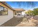 Relaxing backyard patio with gravel ground cover and desert landscaping at 14237 N Westminster Pl, Fountain Hills, AZ 85268
