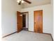 Bedroom with access to another room and closet at 14237 N Westminster Pl, Fountain Hills, AZ 85268