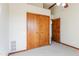 Bedroom with double doors and access to another room at 14237 N Westminster Pl, Fountain Hills, AZ 85268