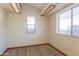 Bright bedroom with wood floors and large windows at 14237 N Westminster Pl, Fountain Hills, AZ 85268