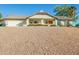 Single-story home with a tile roof and a large front yard at 14237 N Westminster Pl, Fountain Hills, AZ 85268