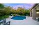 Tranquil pool area with waterfall and lounge chairs at 15250 S 20Th Pl, Phoenix, AZ 85048