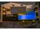 Nighttime view of home and pool from above at 18402 N 65Th Pl, Phoenix, AZ 85054
