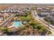 Aerial view showing community pool, playground and homes at 18402 N 65Th Pl, Phoenix, AZ 85054