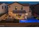 Two-story home with a pool and backyard entertainment area at 18402 N 65Th Pl, Phoenix, AZ 85054