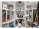 Well-organized pantry with ample shelving for storage at 18402 N 65Th Pl, Phoenix, AZ 85054