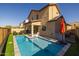 Stunning pool and patio area with a spacious backyard, perfect for entertaining at 18402 N 65Th Pl, Phoenix, AZ 85054