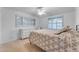 Bright bedroom showcasing a large window, shutters, and a neutral color palette at 2011 W Cambridge Ave, Phoenix, AZ 85009