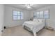 Serene bedroom with plantation shutters and a cozy bed at 2011 W Cambridge Ave, Phoenix, AZ 85009