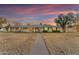 Well-maintained home with a long walkway and a large front yard at 2011 W Cambridge Ave, Phoenix, AZ 85009