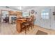 Charming kitchen with tile floors, breakfast bar, neutral countertops, and ample cabinet space at 2011 W Cambridge Ave, Phoenix, AZ 85009