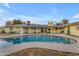 Backyard pool providing a serene oasis with an inviting covered patio at 2011 W Cambridge Ave, Phoenix, AZ 85009