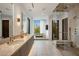 Spa-like bathroom with soaking tub, walk-in shower, and dual vanities at 27951 N 96Th Pl, Scottsdale, AZ 85262