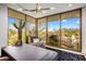 Spacious home office with large windows offering scenic views at 27951 N 96Th Pl, Scottsdale, AZ 85262
