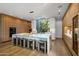 Gourmet kitchen with marble countertops and wood cabinetry at 27951 N 96Th Pl, Scottsdale, AZ 85262
