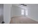 Bright bedroom with carpet, vaulted ceiling and natural light from two windows at 3104 E Broadway Rd # 16, Mesa, AZ 85204
