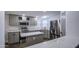 Charming kitchen features stainless steel appliances and white stone countertops with an island at 3104 E Broadway Rd # 16, Mesa, AZ 85204