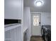 Well-lit laundry room with modern appliances and convenient storage cabinets at 3104 E Broadway Rd # 16, Mesa, AZ 85204