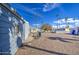 Backyard featuring gravel landscaping, palm trees, and shed for extra storage at 3104 E Broadway Rd # 4, Mesa, AZ 85204