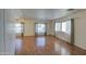 Inviting living room filled with natural light and beautiful wood flooring at 3104 E Broadway Rd # 4, Mesa, AZ 85204