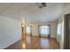 Spacious living room featuring wood floors and plenty of natural light at 3104 E Broadway Rd # 4, Mesa, AZ 85204