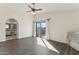 Spacious bedroom features hardwood floors and sliding glass doors to a deck at 3435 E Desert Trumpet Rd, Phoenix, AZ 85044
