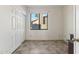 Simple bedroom with double door closet and tiled floors at 3435 E Desert Trumpet Rd, Phoenix, AZ 85044