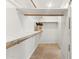 Walk-in closet with ample shelving and hanging space at 3435 E Desert Trumpet Rd, Phoenix, AZ 85044