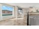 Kitchen with view of backyard pool and sliding glass doors at 3435 E Desert Trumpet Rd, Phoenix, AZ 85044