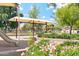 Shaded playground with swings and slide at 3435 E Desert Trumpet Rd, Phoenix, AZ 85044