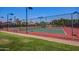 Two well-lit tennis courts for residents to enjoy at 3435 E Desert Trumpet Rd, Phoenix, AZ 85044