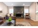 Close up view of a living room fireplace with mantel and decor at 4015 E Emelita Ave, Mesa, AZ 85206