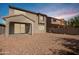 Spacious backyard with gravel and covered patio at 4337 W Powell Dr, Phoenix, AZ 85087