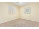 Comfortable bedroom with ceiling fan and neutral wall at 4337 W Powell Dr, Phoenix, AZ 85087