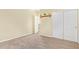 Spacious bedroom with plush carpeting and ample closet space at 4337 W Powell Dr, Phoenix, AZ 85087