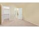 Bedroom with carpet, walk-in closet and bathroom access at 4337 W Powell Dr, Phoenix, AZ 85087