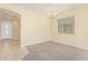 Light and airy dining room with neutral carpeting at 4337 W Powell Dr, Phoenix, AZ 85087