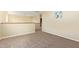 Upstairs hallway with neutral carpeting and access to bedrooms at 4337 W Powell Dr, Phoenix, AZ 85087