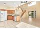 Open kitchen with island and view into living room at 4337 W Powell Dr, Phoenix, AZ 85087