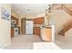 Spacious kitchen with light wood cabinets and white appliances at 4337 W Powell Dr, Phoenix, AZ 85087