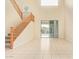 Spacious living room with tile floors and backyard access at 4337 W Powell Dr, Phoenix, AZ 85087