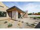 Outdoor patio featuring comfortable seating and sleek architecture overlooking xeriscaping and pool at 4445 E Roma Ave, Phoenix, AZ 85018